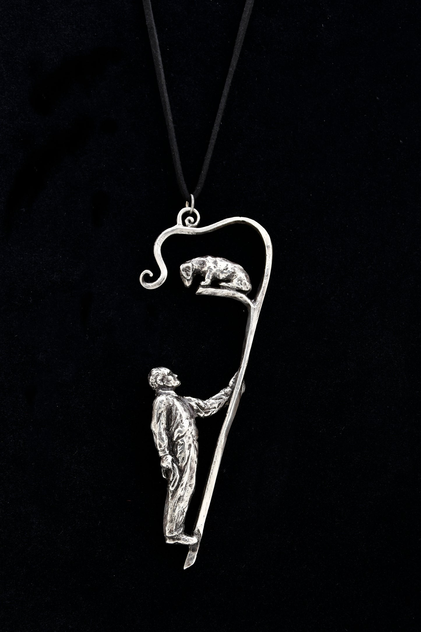 Pendant: Man and dachshund